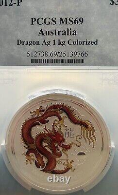 2012-P Year Of The Dragon, 1 Kilo Colorized Dragon With Ruby Eye. Graded Ms 69